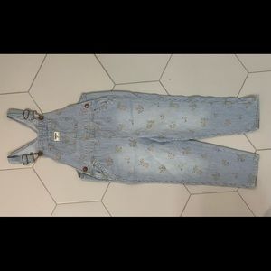 Oskkosh Overalls 5T great used condition. Light denim strip with floral design.